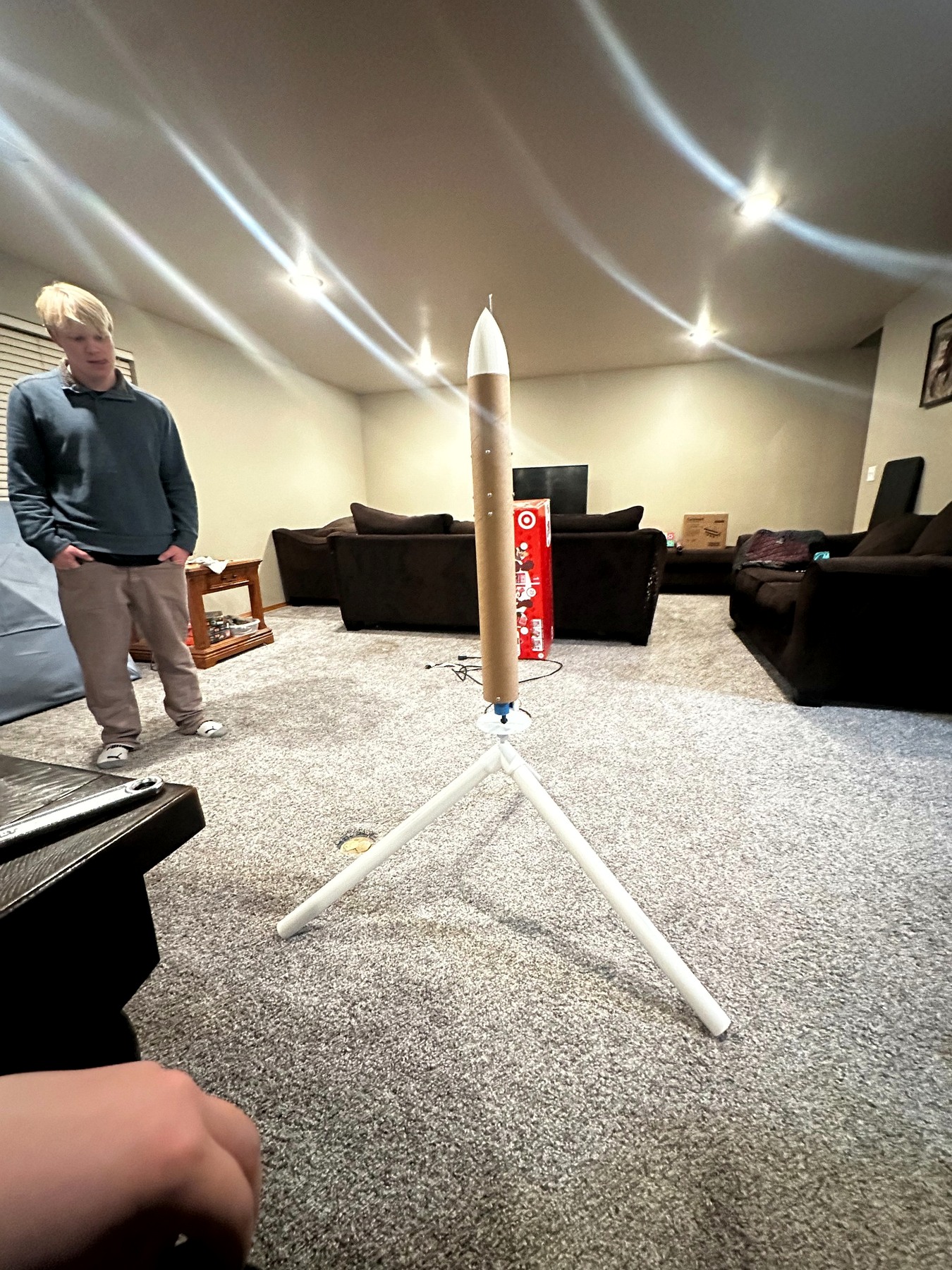 TVC rocket on test stand during indoor testing